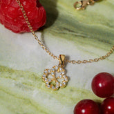 Clover pendant on 18K gold chain